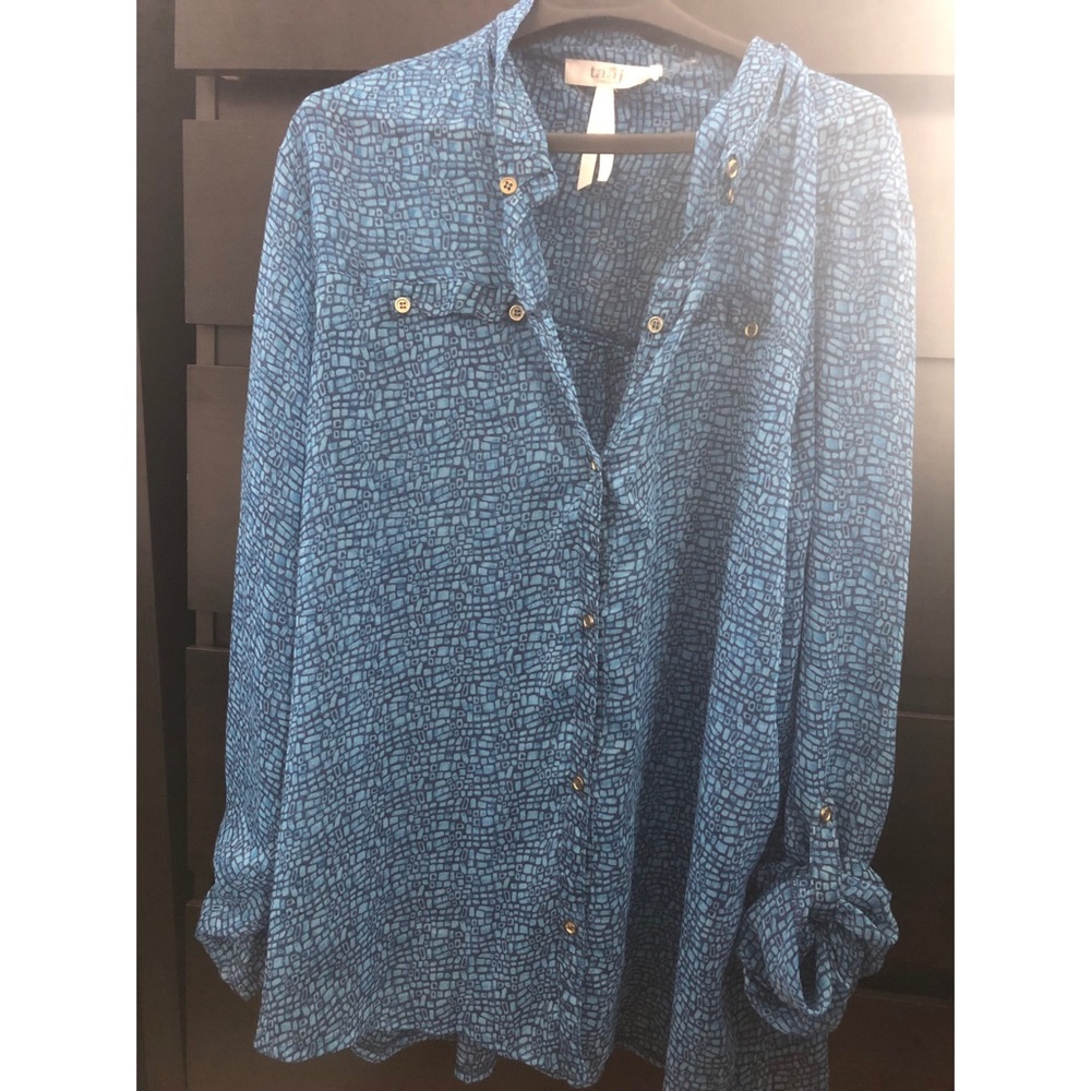 Blue colored blouse.Barely worn.